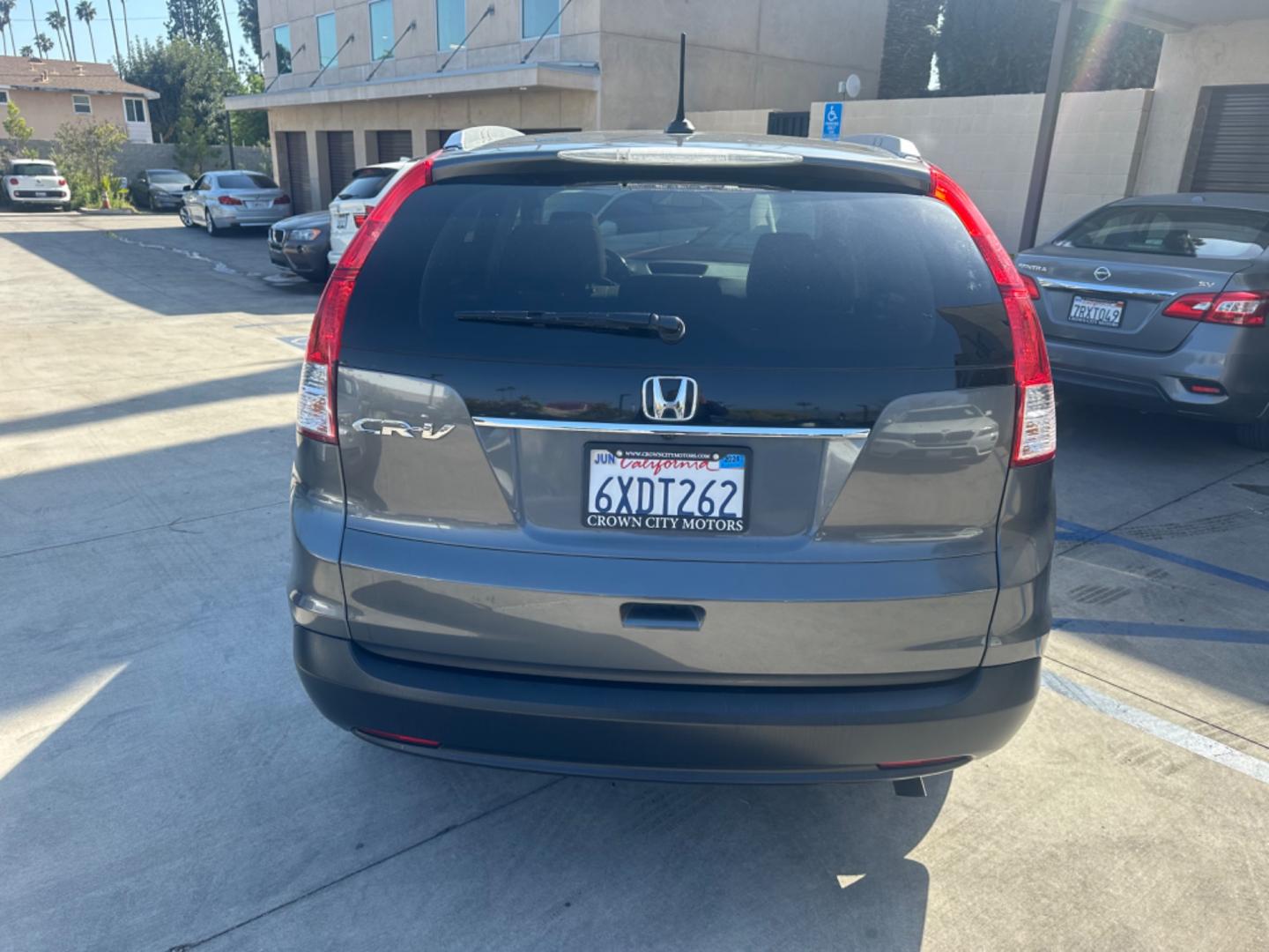 2012 BLUE /GRAY Honda CR-V leather (JHLRM3H70CC) with an 4 CYLINDER engine, Automatic transmission, located at 30 S. Berkeley Avenue, Pasadena, CA, 91107, (626) 248-7567, 34.145447, -118.109398 - Cars and Trucks!! Leather! Moon-roof! Well equipped! In the bustling streets of Pasadena, CA, and the vibrant neighborhoods of Altadena, Glendale, and the broader LA County, finding a reliable, stylish, and affordable vehicle can be a daunting task, especially if you're navigating the complexities - Photo#4